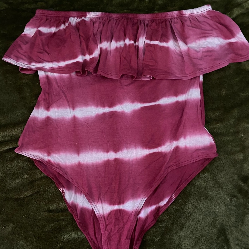 maroon and white body suit